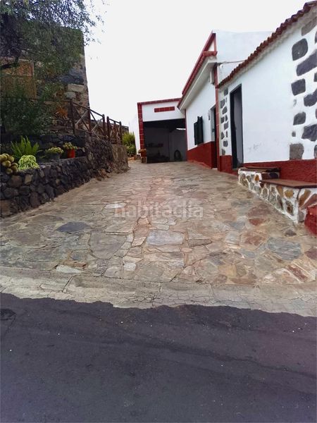 Foto 8ca6dce2-f793-43b9-8aab-00b3a24fbdd6. Casa amb xemeneia aparcament a Guía de Isora interior Guía de Isora