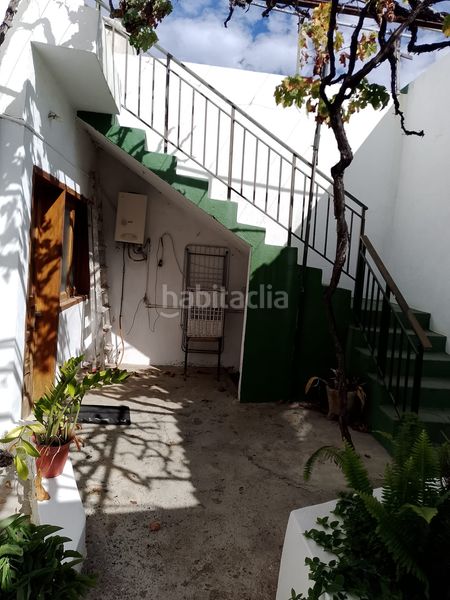 Foto 95455640-3052-4d2c-9beb-149cf830acef. Casa amb xemeneia aparcament a Guía de Isora interior Guía de Isora