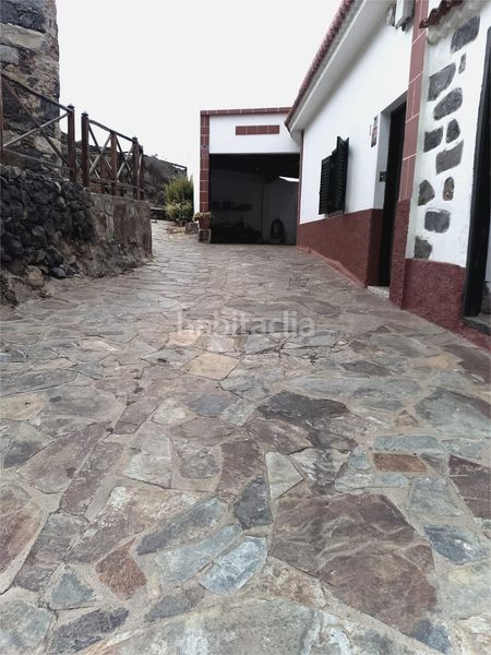 Foto 9dcac95b-760c-46c9-a397-a409c05fd096. Casa amb xemeneia aparcament a Guía de Isora interior Guía de Isora