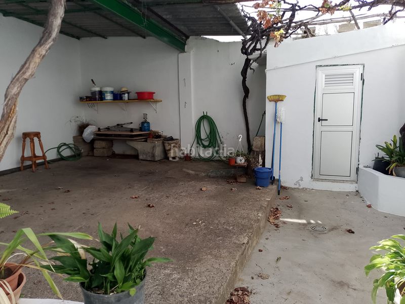 Foto bc5b7d03-f699-4b9e-9979-dc2b32b377d4. Casa amb xemeneia aparcament a Guía de Isora interior Guía de Isora