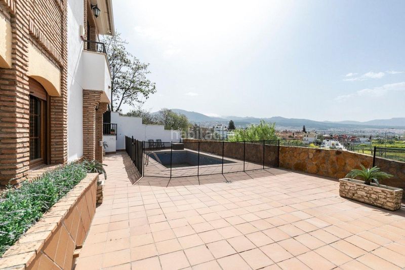 Foto 971ca043-67c7-4560-92a8-58b5e9a86c96. Casa amb calefacció aparcament piscina a Huétor Vega
