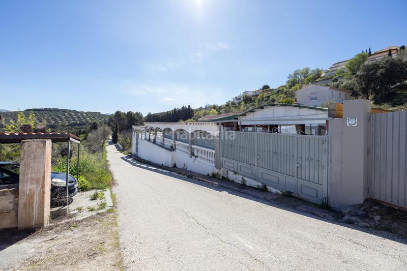 Foto 24bdf7cb-3b15-41f4-b270-3d79205cd301. Chalet espectacular chalet con piscina, jardines y salón de fiestas en puerto lope ! en Moclín