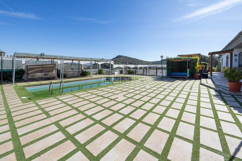 Foto 417dace5-7886-417a-b989-113d94d914a7. Chalet espectacular chalet con piscina, jardines y salón de fiestas en puerto lope ! en Moclín