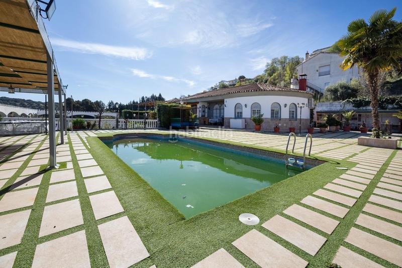 Foto 4a6e9704-39d6-4597-903b-373631c77033. Chalet espectacular chalet con piscina, jardines y salón de fiestas en puerto lope ! en Moclín