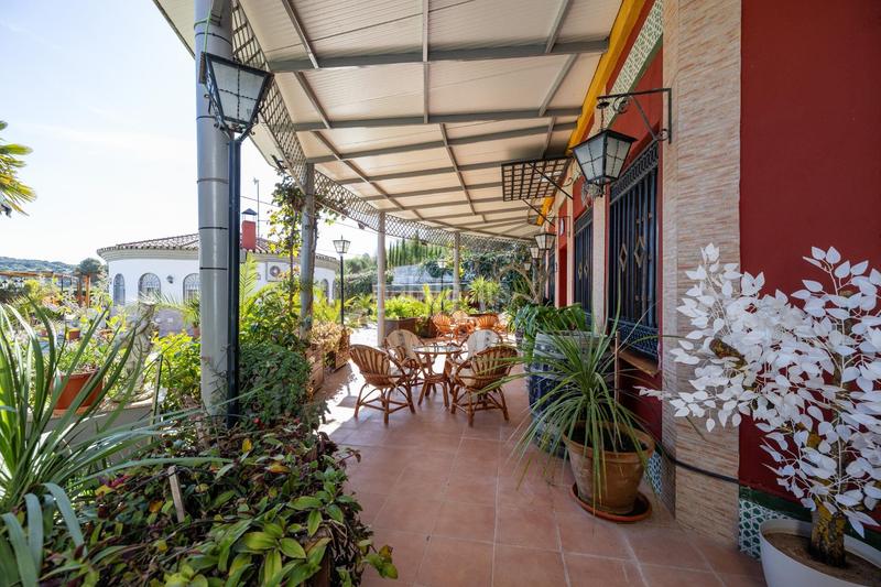 Foto 9dd78094-652a-4468-a8c2-d5e1736f2365. Chalet espectacular chalet con piscina, jardines y salón de fiestas en puerto lope ! en Moclín