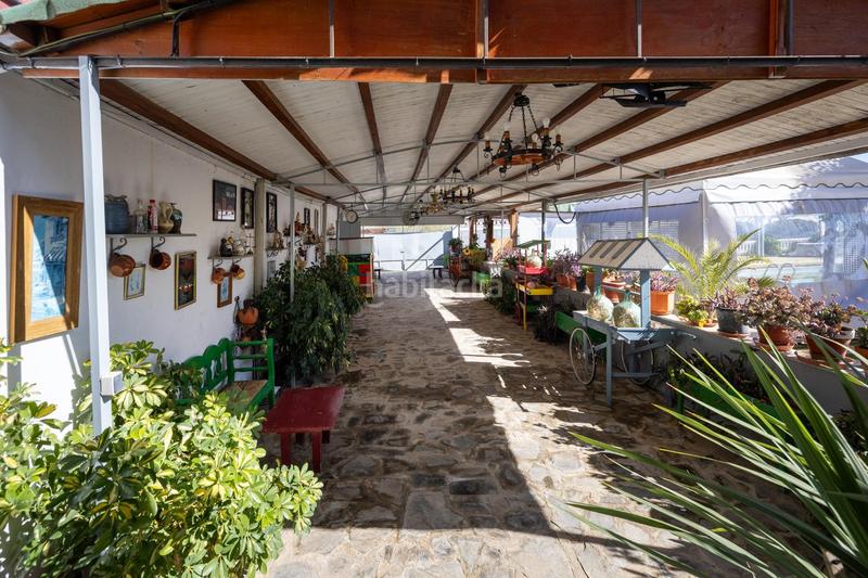 Foto f4be401e-95ab-4190-9283-85d8329da040. Chalet espectacular chalet con piscina, jardines y salón de fiestas en puerto lope ! en Moclín