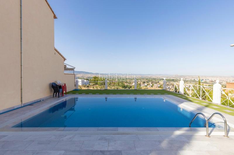 Foto 99c02522-e6b7-4041-9a10-d0cea5fd6e91. Reihenhaus mit heizung parking pool in Camino de los Neveros - Serrallo Granada