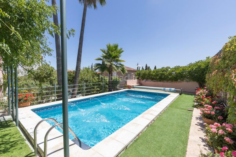 Foto 186adcc2-fc9e-42a6-8011-f3efa6c80862. Casa amb aparcament piscina a San Francisco - El Chorrillo Gabias (Las)