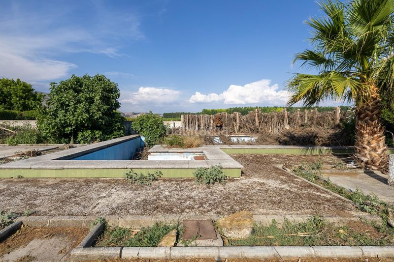 Foto a35ffc12-a161-4fc5-91c6-4df222946199. Casa amb piscina a Chauchina