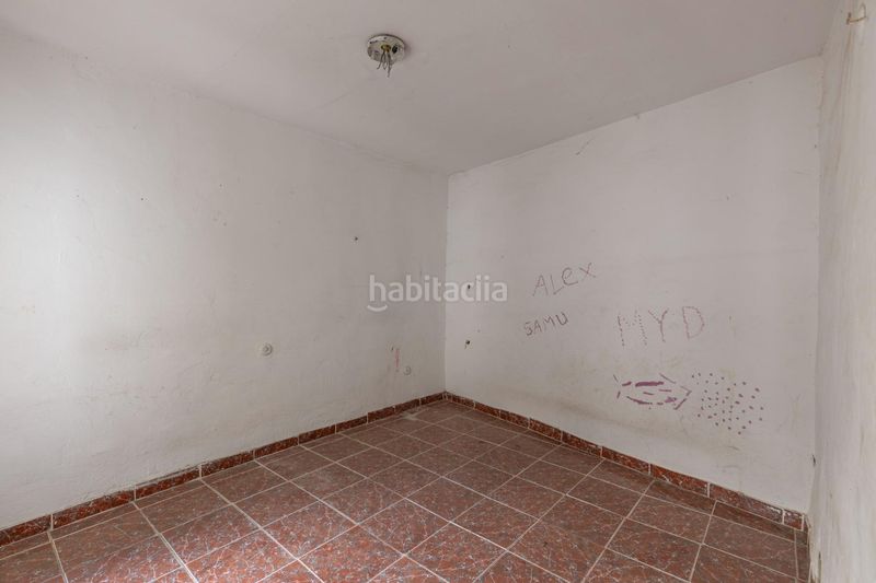 Foto a5f7e95b-27c0-4251-aef3-31cef61f805e. Casa amb aparcament a Bola de Oro Granada