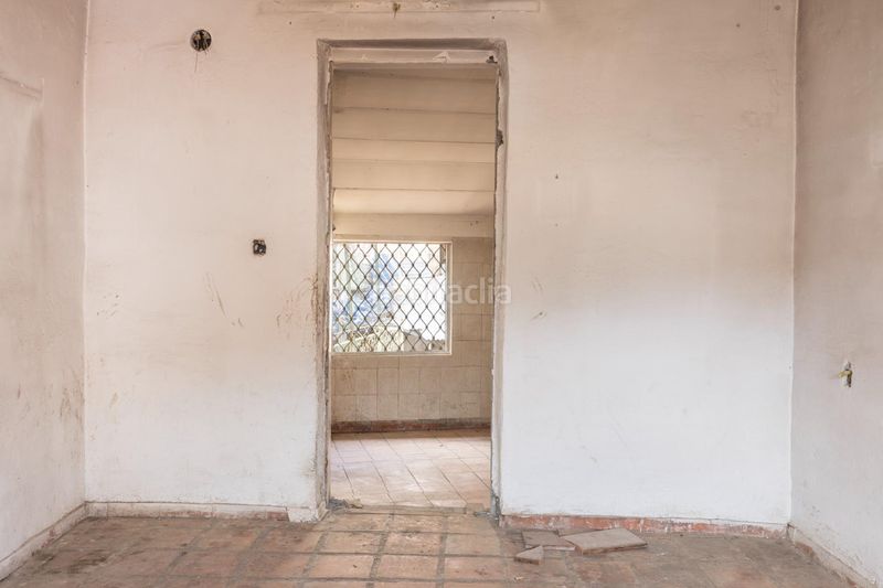 Foto ce1edb03-979e-4873-9ba1-c3b648f0cc39. Casa amb aparcament a Bola de Oro Granada
