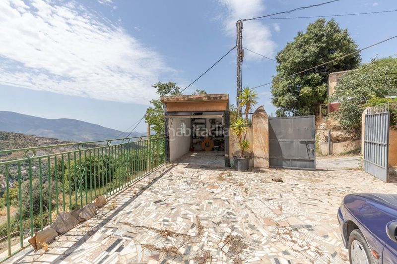 Foto b9b67b60-1f63-4e93-8ebe-84fa50d5e6f7. Casa a calle extrarradio 008 a Lanjarón