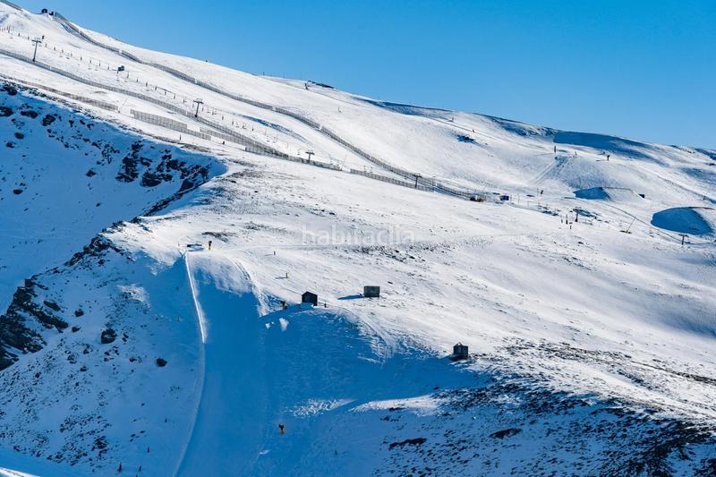 Foto a968b023-ce03-41e2-bddf-531e6f7e302c. Appartamento con parcheggio in Zona alta Sierra Nevada