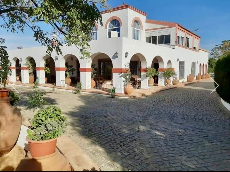 Foto 8c98f664-78c6-42cb-8059-f04513e86bcf. Masia amb calefacció aparcament piscina a Oromana Alcalá de Guadaira