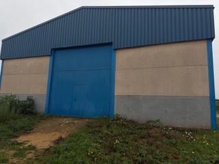 Nau industrial a Pilas. Venta de terreno con nave