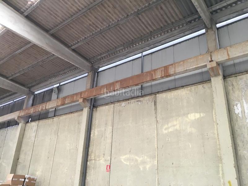 Foto 099fcc9f-f6ca-497c-a9b2-5feacdbd4f7e. Rent industrial building in avenida da praia 109 in Arteixo