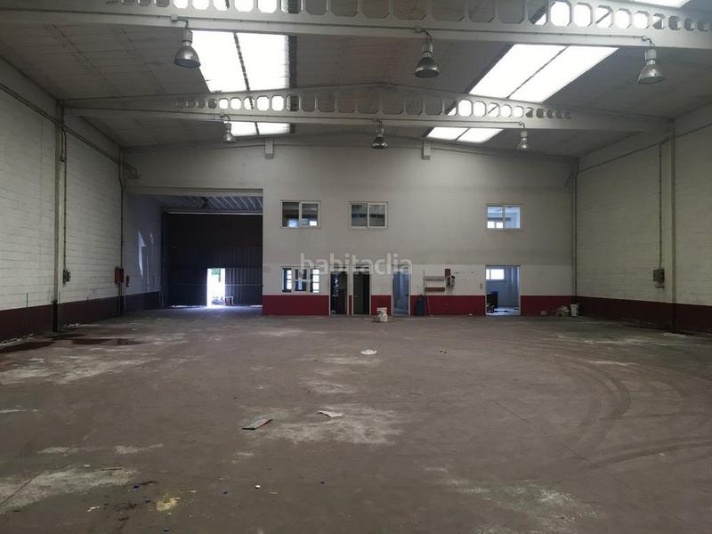 Foto db46691b-ae09-49c1-81a0-ece4e7a93089. Fabrikhalle in Bergondo