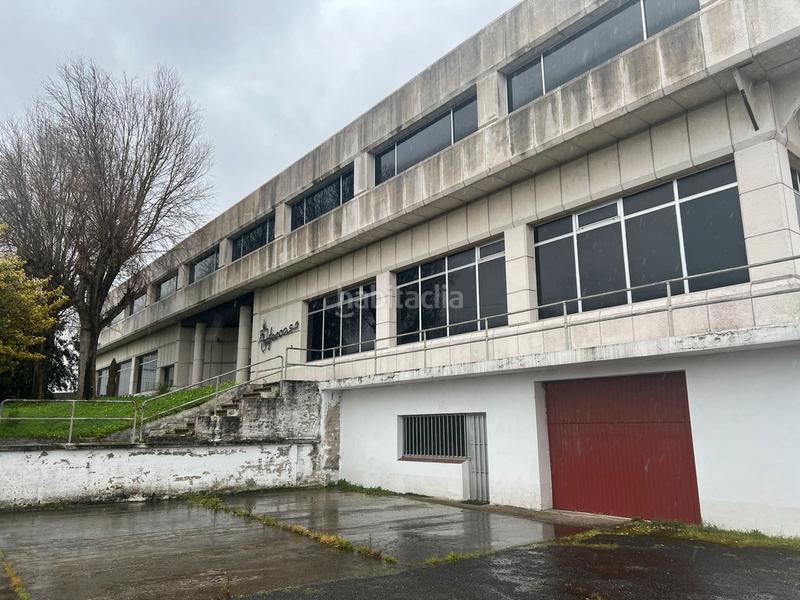 Foto ab30d143-ed1a-45d1-a904-f2fc3d609cce. Rent industrial building with heating in Oseiro Arteixo