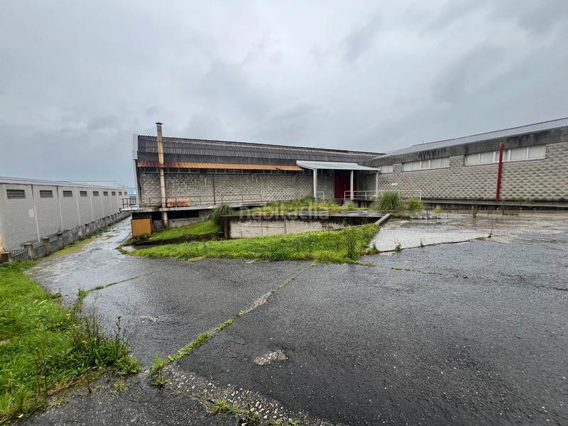 Foto ccc8b0cc-f76d-445e-a67b-e8e4f9fb9d03. Rent industrial building with heating in Oseiro Arteixo