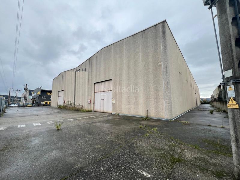 Foto ca59b518-fc7e-4f6f-b1e3-ef82b3579625. Rent industrial building in Oseiro Arteixo