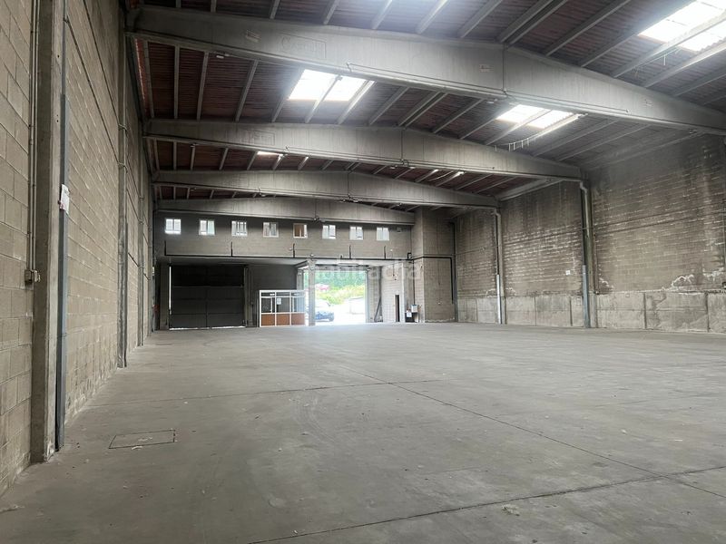 Foto db42ba2e-cb2d-4c0b-b8b8-d60279396a2a. Location bâtiment à usage industriel dans O Milladoiro Ames