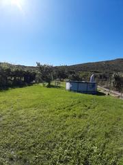 Chalet à Oeste. Finca en el cortijo con casa