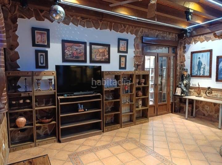 Foto 836d3233-d14f-4217-a0a8-6ace0c0c0f04. Casa  y local en Puebla de Alcocer