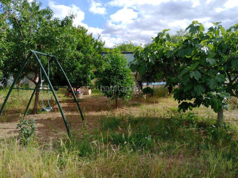Foto 81a9ccf8-f7cc-44dd-b7e2-71ed4b85bc2e. Xalet amb xemeneia aparcament piscina a Don Benito