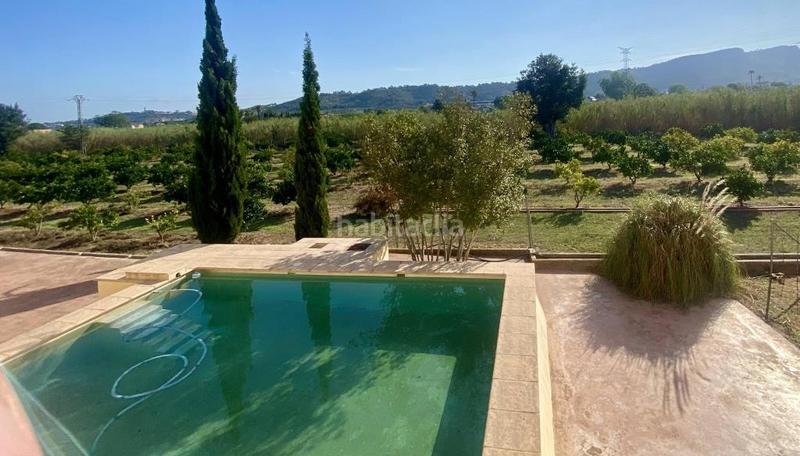 Foto 2358d5c5-f406-46c2-bb02-c086b8e76e59. Xalet amb xemeneia calefacció aparcament piscina a Alzira