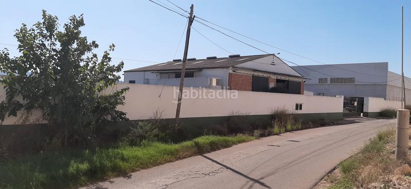 Foto 5f863ad1-fed7-421c-a51e-66ebb58bd04a. Nave industrial  de 676 m² y una parcela de 3612 m² junto a grefusa sl en Alzira