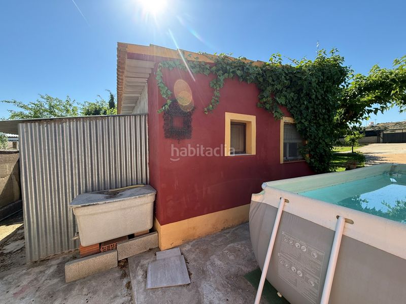 Foto b702107e-d929-4959-aee4-eab4c26f75e3. Xalet amb xemeneia calefacció aparcament piscina a Caspe