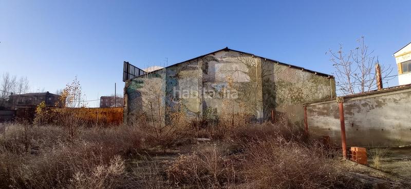 Foto 0525da18-ad4b-470f-97a8-d0ca0bc6d6ae. Bâtiment à usage industriel dans La Vega - La Sal León