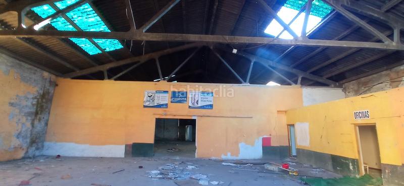 Foto 4d79640d-bc4b-4efd-adcd-0c4302a9c8ee. Bâtiment à usage industriel dans La Vega - La Sal León