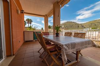 Pis  Calle belgica de. Planta baja en port dalcudia con terraza y piscina
