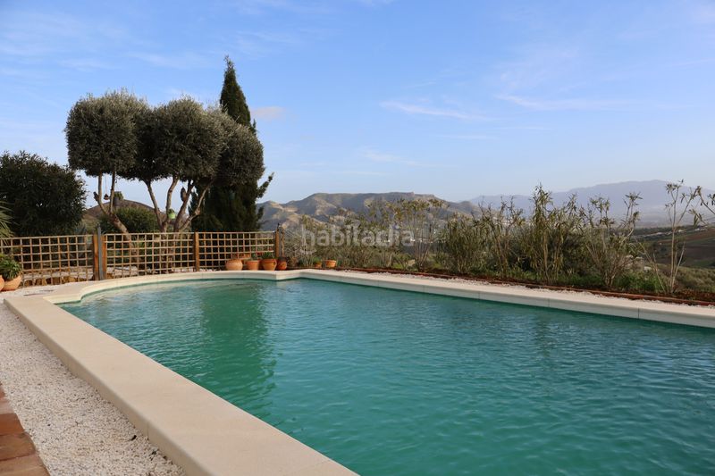 Foto dbe47de1-7207-4bb3-a1b9-b709b27730d9. Masia amb xemeneia piscina a Ardales