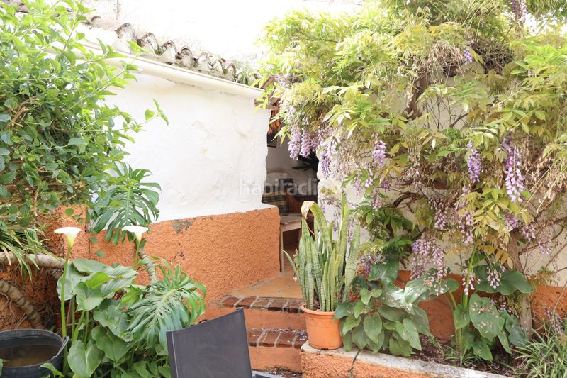 Foto 4bac9aeb-d0ae-4c33-a46c-939b4fdd3ad3. Casa adossada amb xemeneia a Álora