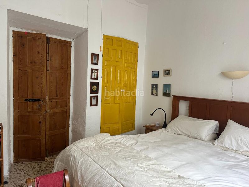 Foto cd74a778-b652-4146-8b27-abe454ec8f75. Casa adossada amb xemeneia a Álora