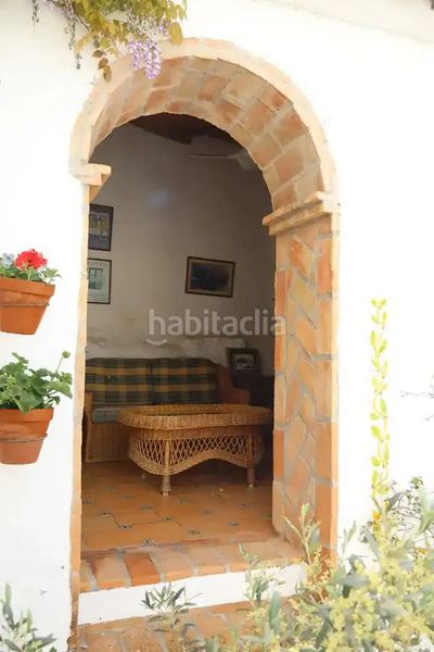 Foto d7348d02-e363-49d4-a38a-14adbd4508c8. Casa adossada amb xemeneia a Álora