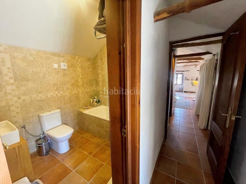 Foto e1f9b17c-db95-4f75-b5c0-cdda35c65215. Masia amb xemeneia aparcament piscina a Álora
