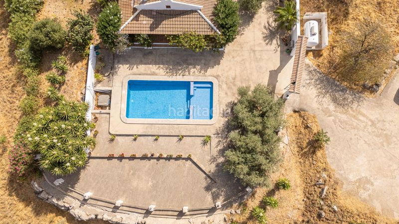 Foto c97fad1d-d3a1-41fb-8c09-c5023d4b7aeb. Masia amb xemeneia calefacció piscina a Valle de Abdalajís