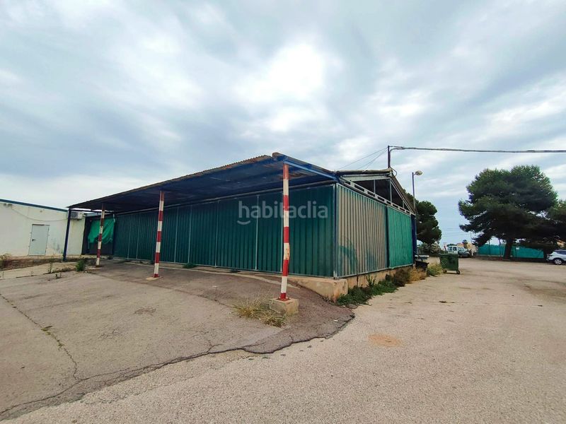 Foto bc3f90ab-b787-43ce-926c-975314f746d6. Nau industrial a Mareny de Barraquetes Sueca
