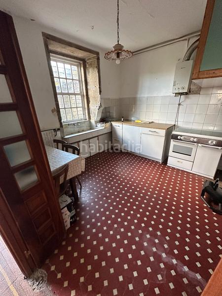 Foto fdf0cb76-e123-4de7-832d-11c397a2a5cb. Casa amb xemeneia calefacció a Cuntis