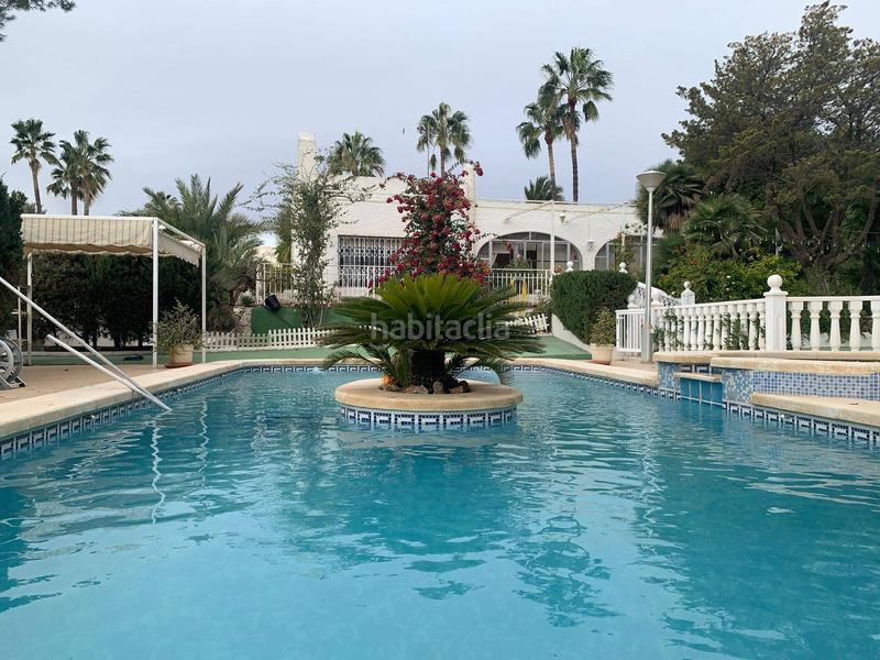 Foto ade19bcc-61d4-4c58-973b-482b62092320. Xalet amb calefacció aparcament piscina a El Toscar Elche / Elx