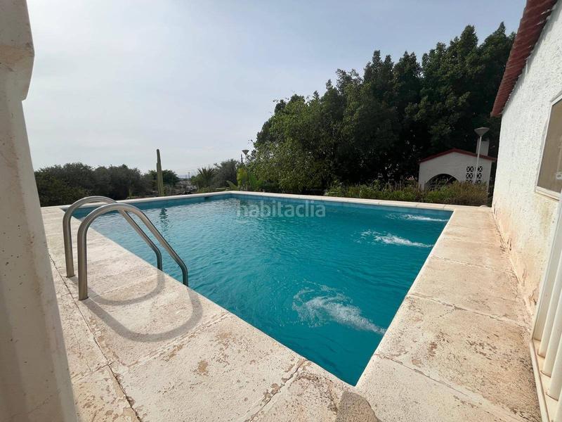 Foto c0eee7dc-16f2-4af6-bc0d-663867fc06c4. Chalet con parcheggio piscina in Peña de las Águilas Elche / Elx