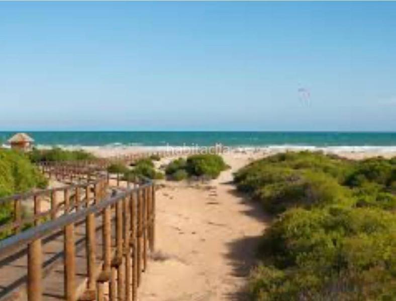 Foto a262ba64-db35-45fd-81ae-ec0574fc01ab. Chalet con riscaldamento piscina in La Marina Elche / Elx