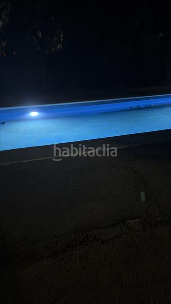 Foto b7848e0c-ba84-434a-884d-13a13c0a0257. Chalet with fireplace parking pool in Sanlúcar la Mayor