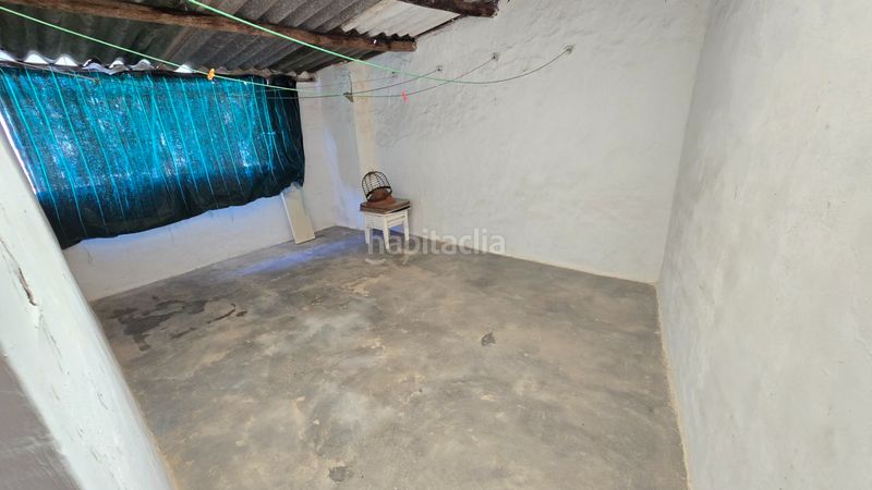 Foto b9f8a012-cd11-4902-aae5-240903ef2ceb. Casa a calle chaparro 35 a Aliseda