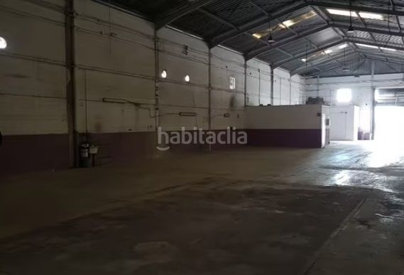 Foto c91fa845-1d9d-4e00-a305-c69814d2dc49. Location bâtiment à usage industriel dans Algaba (La)
