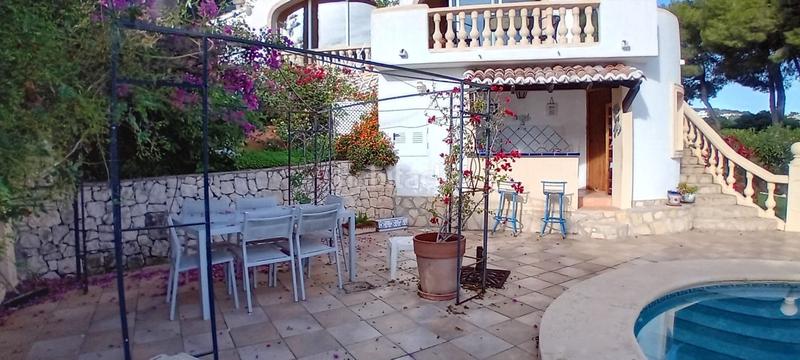 Foto 5fae063b-26b3-42b1-b143-8391d16d71e0. Chalet magnífica villa de 4 dormitorios, con vistas al mar hacia la bahía , en la zona de fanadix, con piscina y garaje. oportu en Moraira