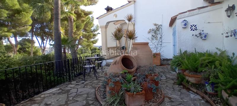 Foto 94f92387-1d14-4462-bb30-68f2be3f3d7c. Chalet magnífica villa de 4 dormitorios, con vistas al mar hacia la bahía , en la zona de fanadix, con piscina y garaje. oportu en Moraira